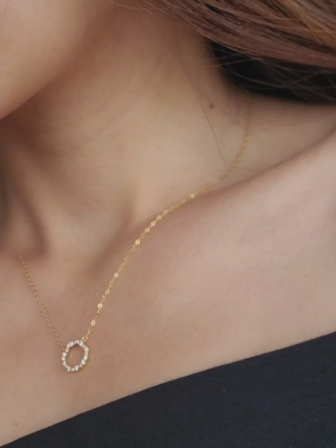 Model wearing Gold Vermeil Infinity Circle Necklace, showcasing its minimalist design.