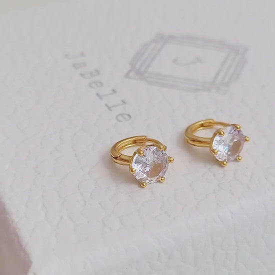 Stylish and dainty solitaire cubic zirconia earrings in gold vermeil finish, ideal for gifting.