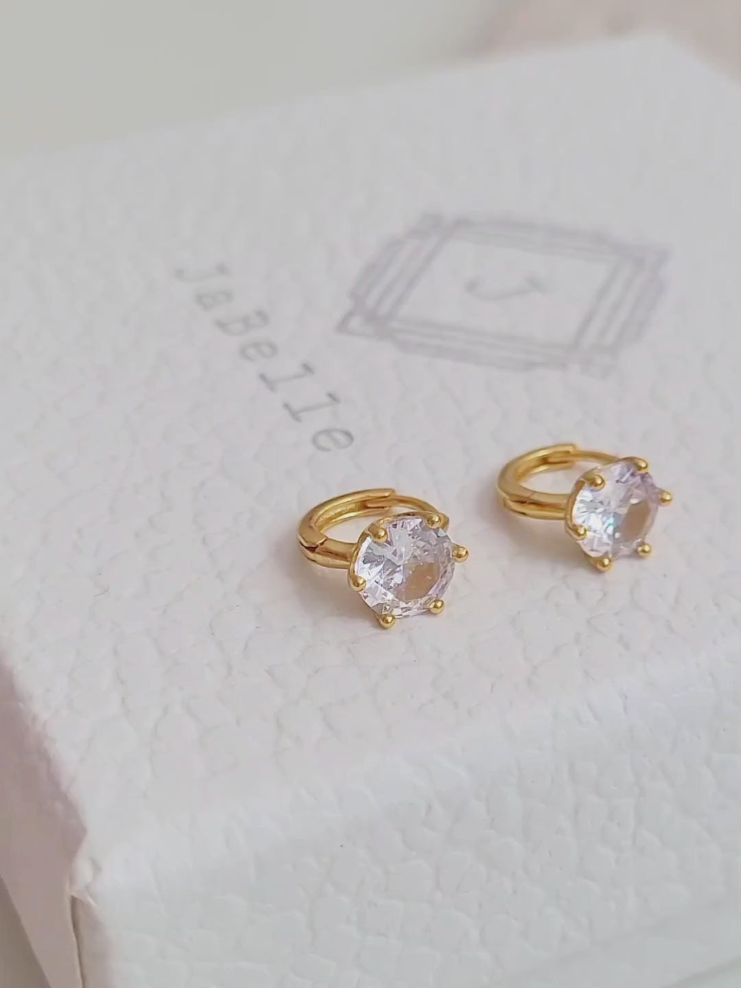 Stylish and dainty solitaire cubic zirconia earrings in gold vermeil finish, ideal for gifting.