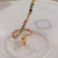 Close-up of a boho-chic beaded bracelet featuring natural tourmaline and gold plated beads. Perfect gift for her.