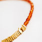 Close up of a red onyx gemstone choker necklace featuring 22k gold vermeil triangular beads, dainty and stylish jewellery