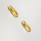 Close up of Turquoise star huggie hoop earring crafted in gold plated sterling silver, featuring a cosmic star inspired design. Minimalist earring design, perfect birthday gift for her.