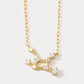 A dainty gold necklace with a pendant featuring a stylized Virgo zodiac constellation sign with sparkling zircons. Perfect jewellery gift for birthday.