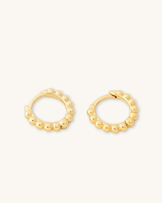 gold beaded huggies earrings
