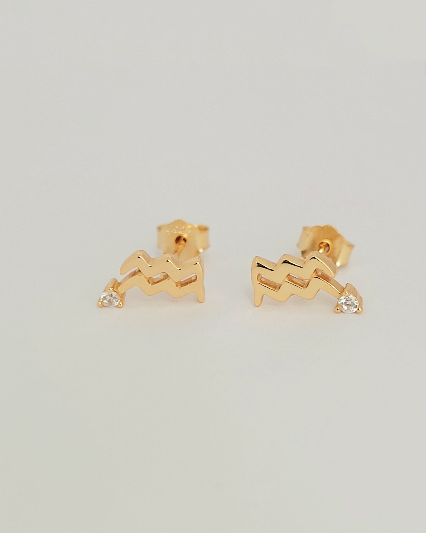 gold Aquarius earrings