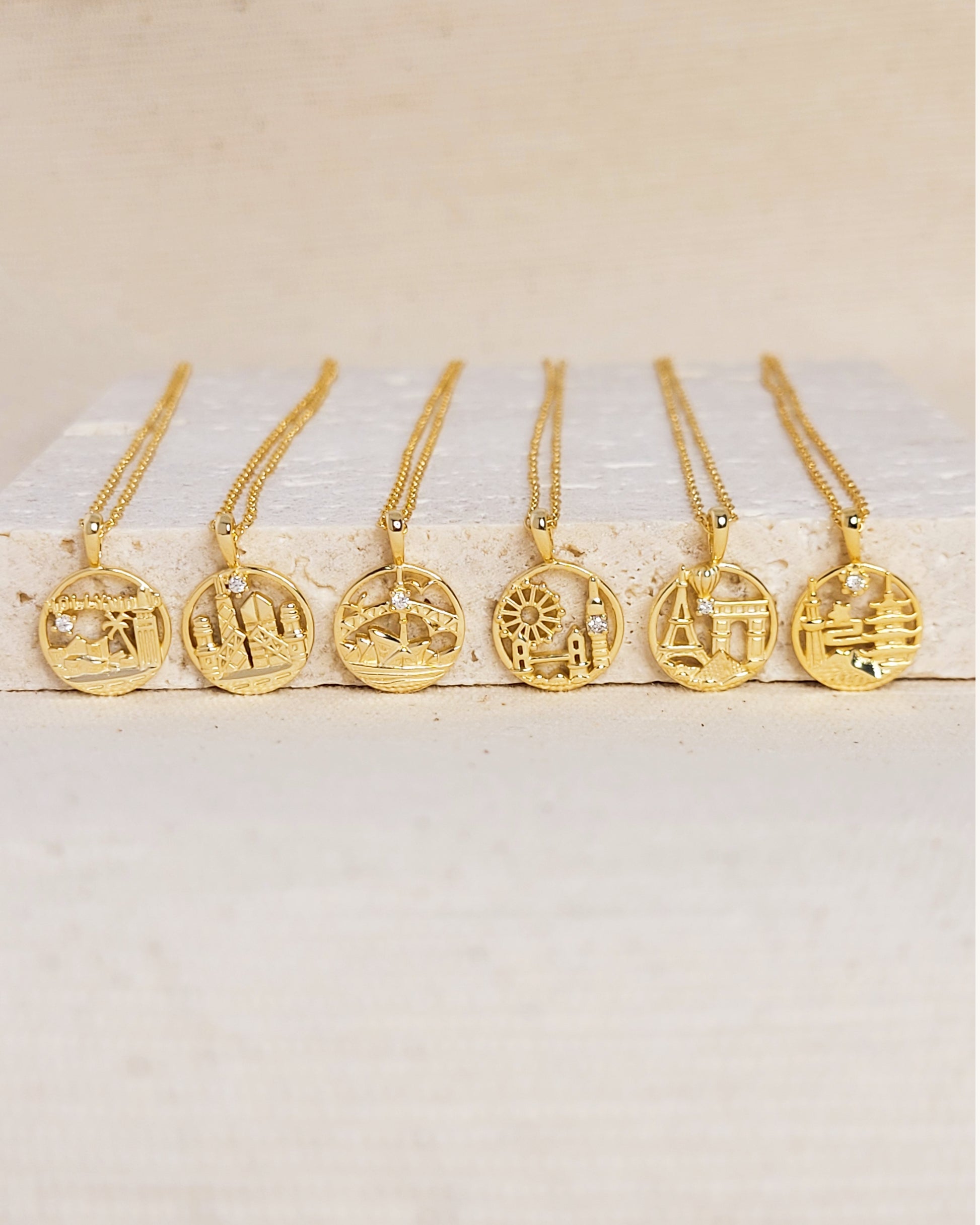 Set of city themed pendant necklace